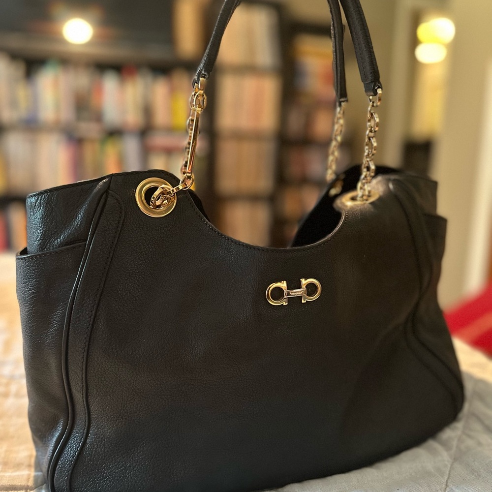 Ferragamo black leather chain metal handbag.